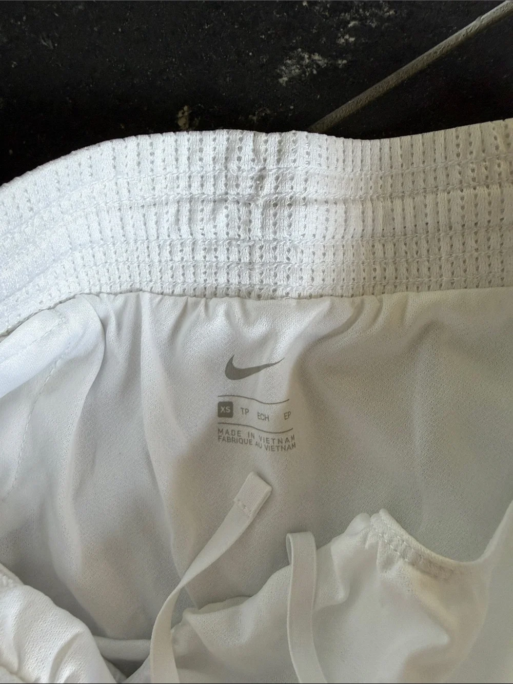 Nike Women’s White Athletic Shorts with Orange Swoosh size XS